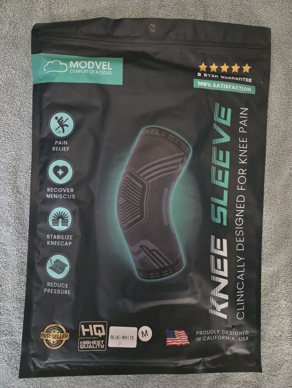 Modvel compression knee brace Medium. Blue/white